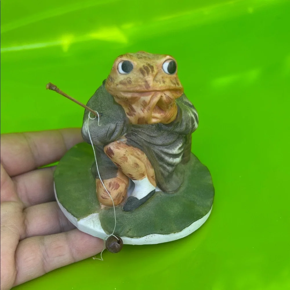 Vintage Reptile Figurine with Fishing Rod